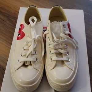 Red and white converse sneakers